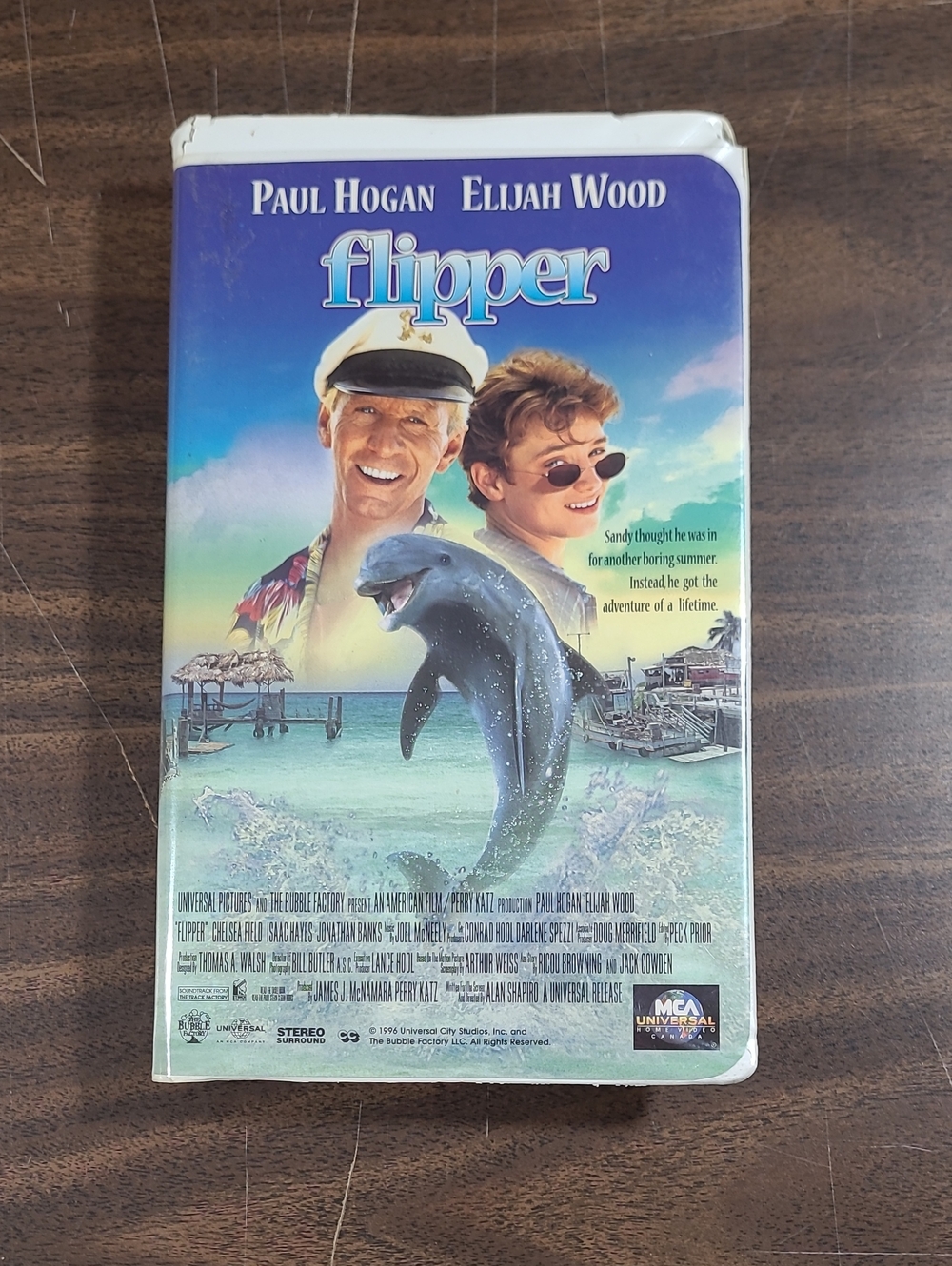 Flipper VHS Movie Paul Hogan Elijah Wood - in Clamshell
